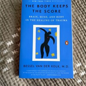 The Body Keeps the Score by Bessel van der Kolk - Blue Paperback (Penguin)
